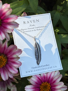 Hand-engraved Raven Feather Necklace on a sterling silver chain.
