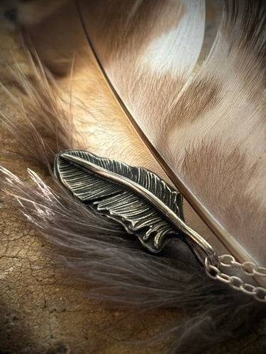 Hand-engraved sterling silver owl feather pendant with a sterling silver chain