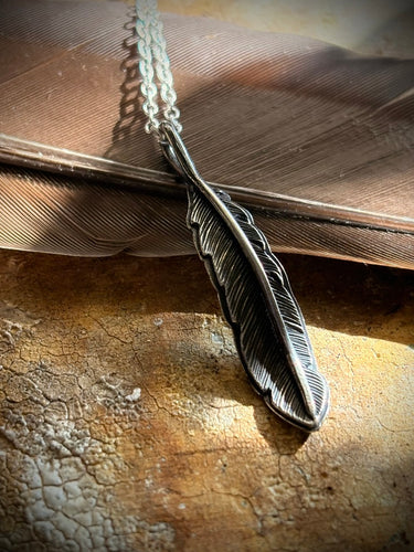 Hand-engraved sterling silver Eagle Feather pendant with a sterling silver chain