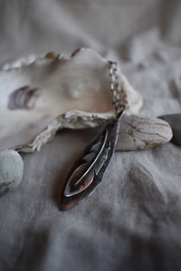 silver feather pendant