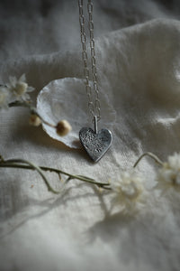 hand engraved flower and bird silver heart pendant 