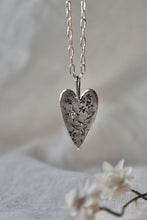 Load image into Gallery viewer, Hand engraved silver heart necklace. Hummingbird , Forget me not and clear CZ
