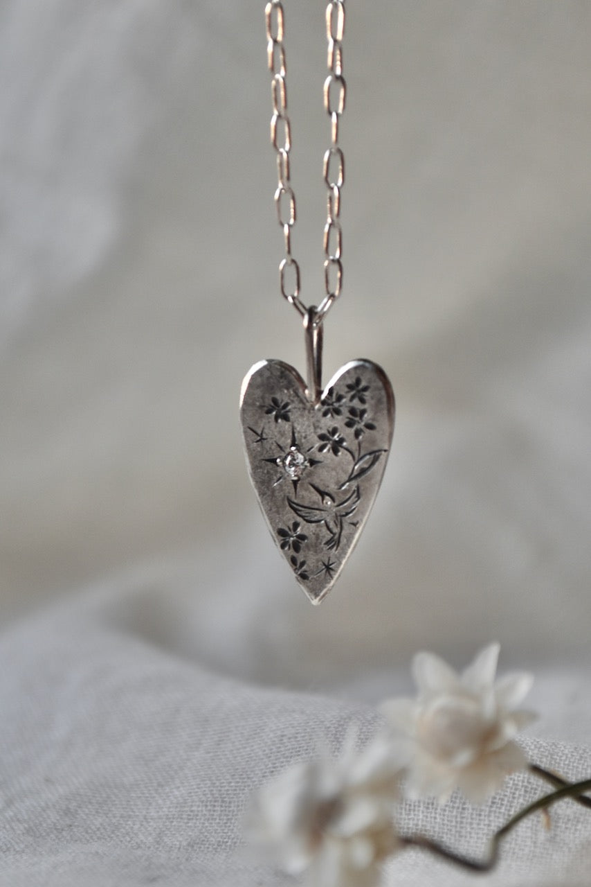 Hand engraved silver heart necklace. Hummingbird , Forget me not and clear CZ